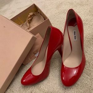 Wonderful Miu Miu red shoes.